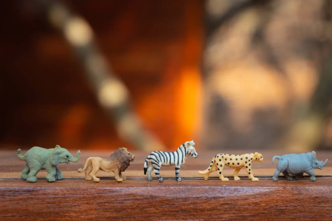 Plastic jungle animals in a line