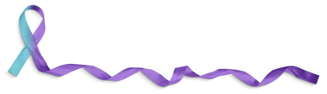 A teal and purple ribbon uncurling across the screen. Suicide Prevention Awareness ribbon